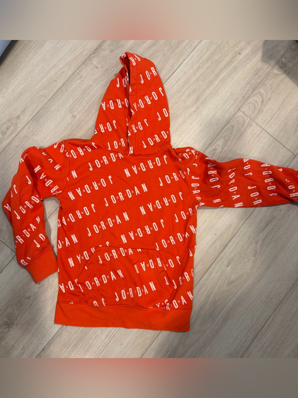 Jordan boys hoodie- orange w/ white logo  size 10-12 (medium)